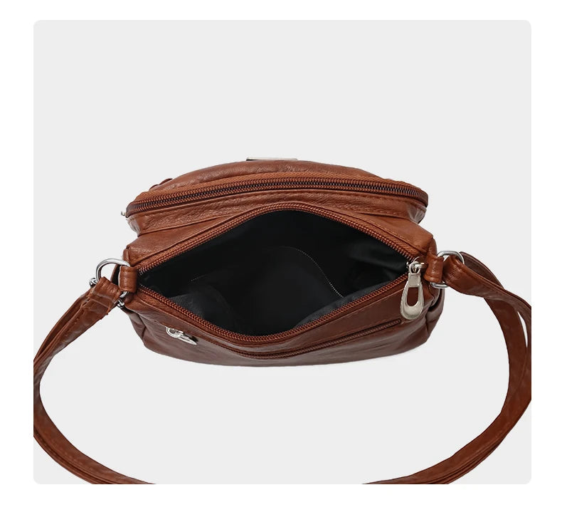 Fashion trend four-season soft leather multi-compartment crossbody handbag