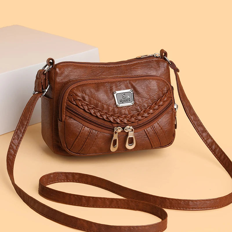 Fashion trend four-season soft leather multi-compartment crossbody handbag