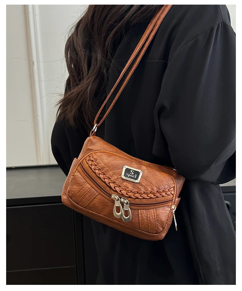 Fashion trend four-season soft leather multi-compartment crossbody handbag