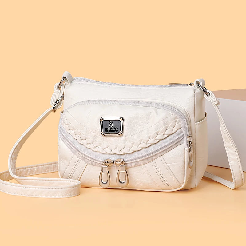Fashion trend four-season soft leather multi-compartment crossbody handbag
